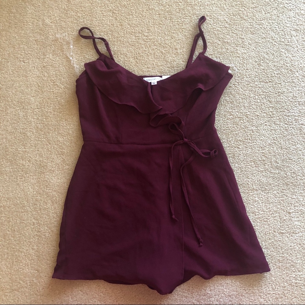 Socialite plum romper size small NWT